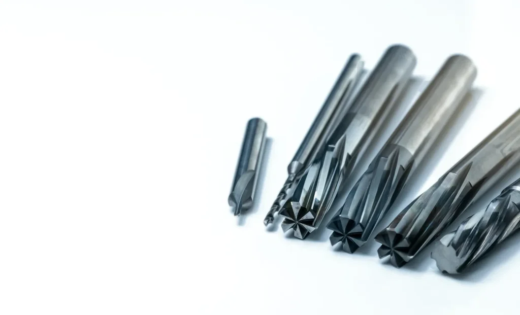 CNC cutting tools of various sizes, used in CNC machining to remove material and shape parts with different geometries and finishes.