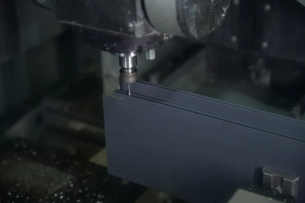 A CNC machine precisely cuts metal for custom parts in China.