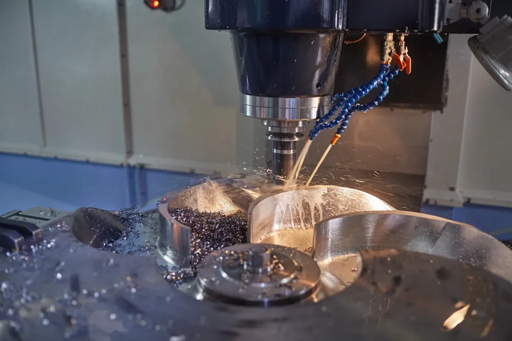 Frezarka CNC tnie magnez, demonstrując możliwości obróbki CNC magnezu.