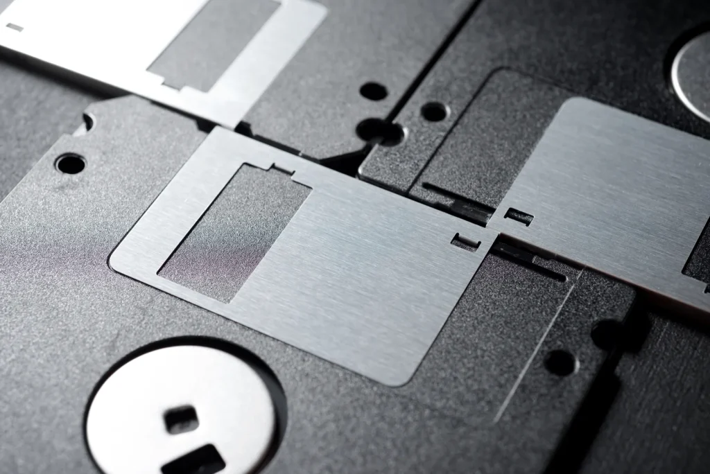 Precision-cut metal parts showcase the results of custom metal stamping services.